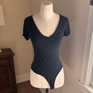 Sleek Black V-Neck Bodysuit